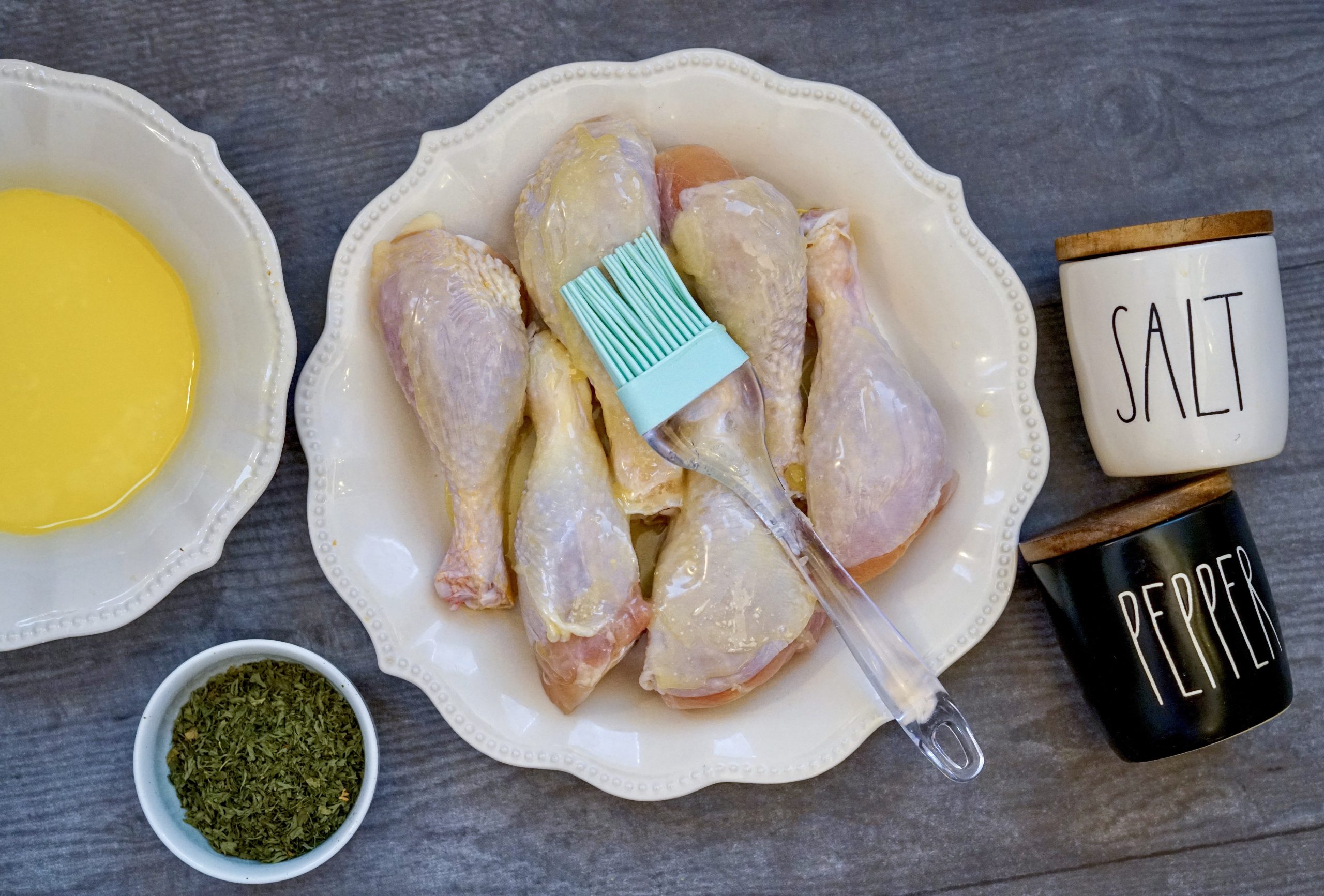 Coat drumsticks with melted butter